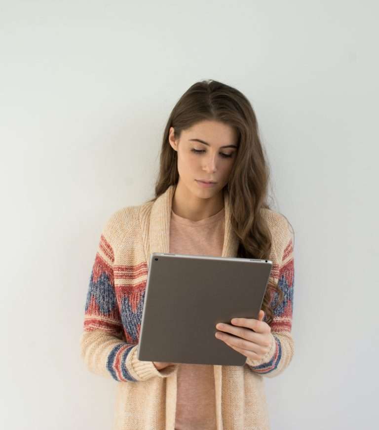 Caucasian lady looking at chart - psychologist